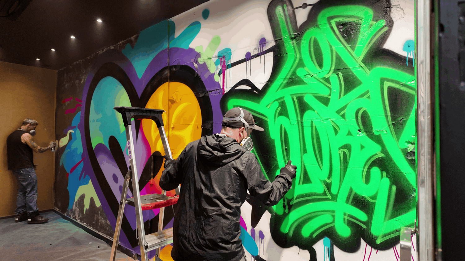 WORK IN PROGRESS STREET ART MURAL BY JASON NAYLOR AND ADAM FUJITA FOR LOS COLORES GROUP URBAN ART SHOW LIEGE BELGIUM AT THE BURONZU GALLERY